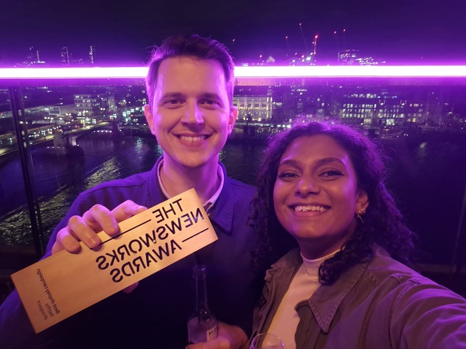 team members holding newsworks award 